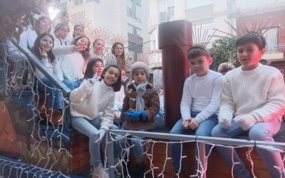 Participación del coro del colegio Alfonso X El Sabio en la llegada y cabalgata de los Reyes Magos